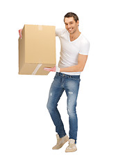 Image showing handsome man with big box
