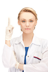 Image showing female doctor with her finger up