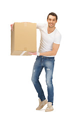 Image showing handsome man with big box