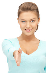 Image showing woman with an open hand ready for handshake