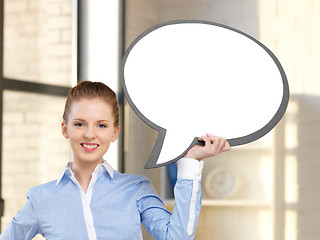 Image showing smiling businesswoman with blank text bubble