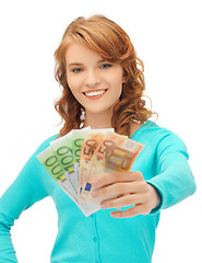 Image showing happy teenage girl with euro cash money