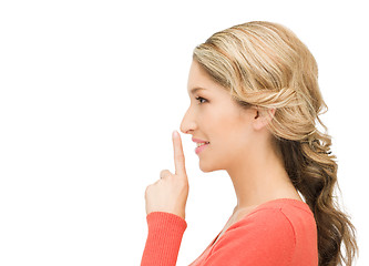 Image showing finger on lips