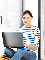 Image showing happy teenage girl with laptop computer