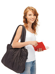 Image showing teenage girl in blank white t-shirt with book