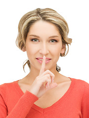 Image showing finger on lips