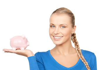 Image showing lovely woman with piggy bank