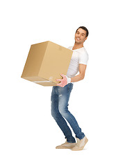 Image showing handsome man with big box