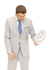 Image showing man with clock