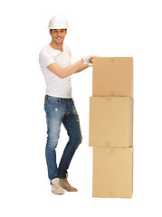 Image showing handsome man with big boxes