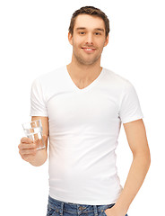 Image showing man in white shirt with glass of water