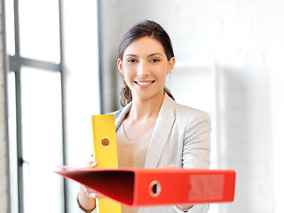 Image showing beautiful woman with folder