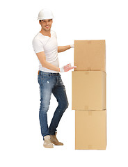 Image showing handsome man with big boxes