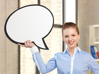 Image showing smiling businesswoman with blank text bubble