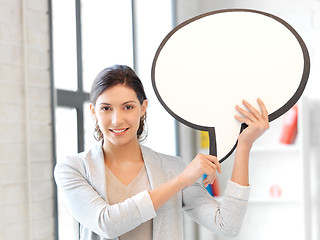 Image showing smiling businesswoman with blank text bubble