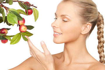 Image showing lovely woman with apple twig