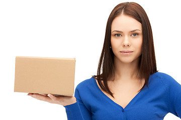 Image showing attractive businesswoman with cardboard box