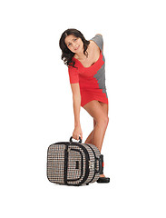 Image showing unhappy woman with heavy suitcase