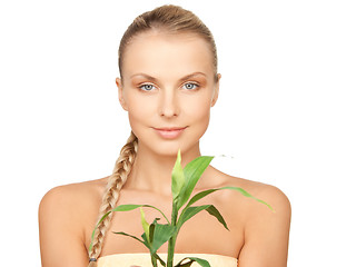 Image showing woman with green sprout