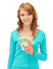 Image showing happy teenage girl with euro cash money