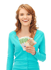 Image showing happy teenage girl with euro cash money