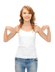 Image showing smiling teenage girl in blank white t-shirt