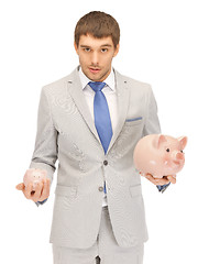 Image showing man with piggy bank