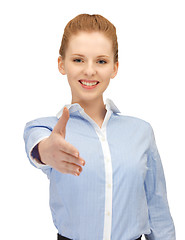 Image showing woman with an open hand ready for handshake