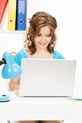 Image showing happy woman with laptop computer