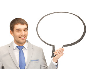 Image showing smiling businessman with blank text bubble