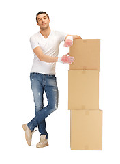 Image showing handsome man with big boxes