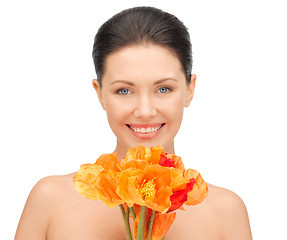 Image showing lovely woman with red flowers