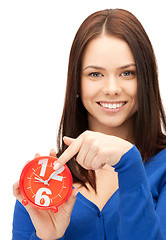 Image showing woman holding alarm clock