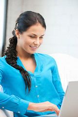 Image showing happy woman with laptop computer