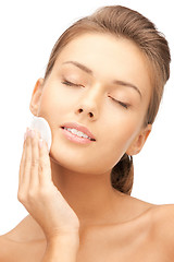 Image showing beautiful woman with cotton pad