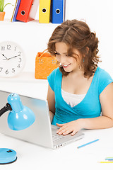 Image showing happy woman with laptop computer