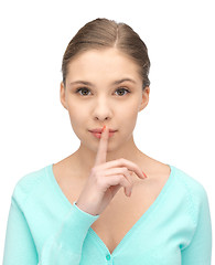 Image showing finger on lips