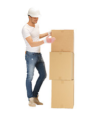 Image showing handsome man with big boxes