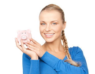 Image showing lovely woman with piggy bank