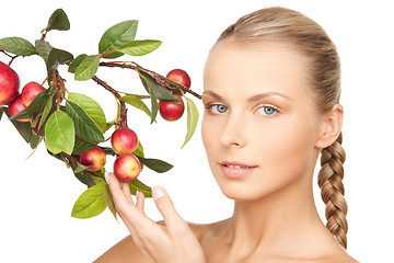 Image showing lovely woman with apple twig