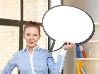 Image showing smiling businesswoman with blank text bubble