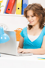 Image showing happy woman with laptop computer