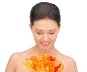 Image showing lovely woman with red flowers