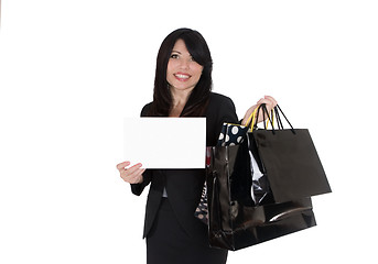 Image showing Boutique shopper holding up a sign