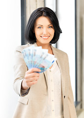 Image showing lovely woman with euro cash money