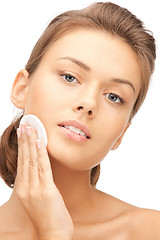 Image showing beautiful woman with cotton pad