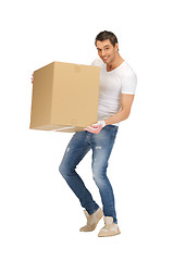 Image showing handsome man with big box