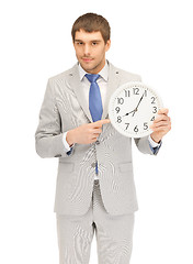 Image showing man with clock