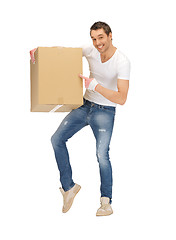 Image showing handsome man with big box