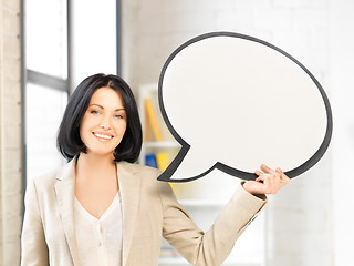 Image showing smiling businesswoman with blank text bubble